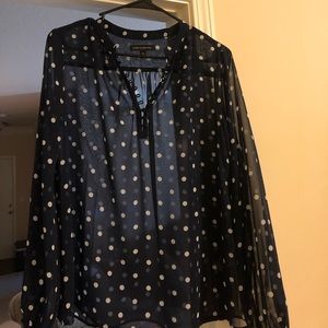 Navy and white polka dot top